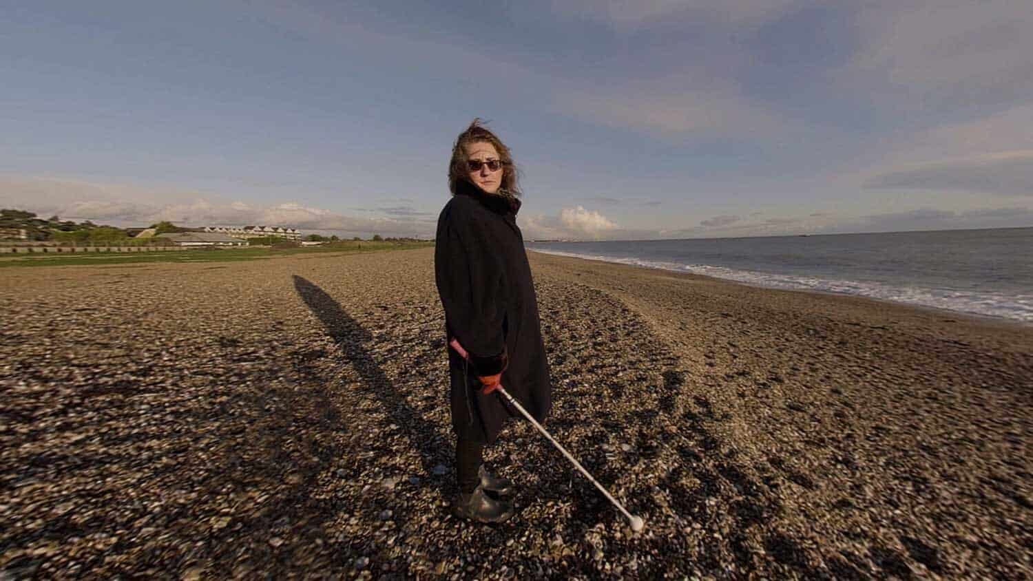 woman standing on beach from VR film