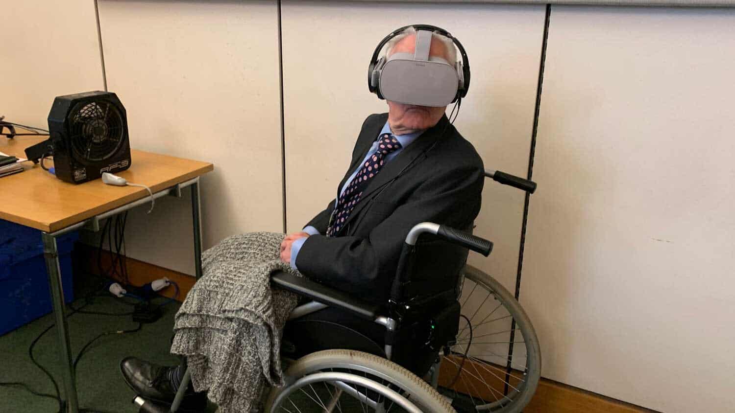 man wearing a VR headset with SFX systems