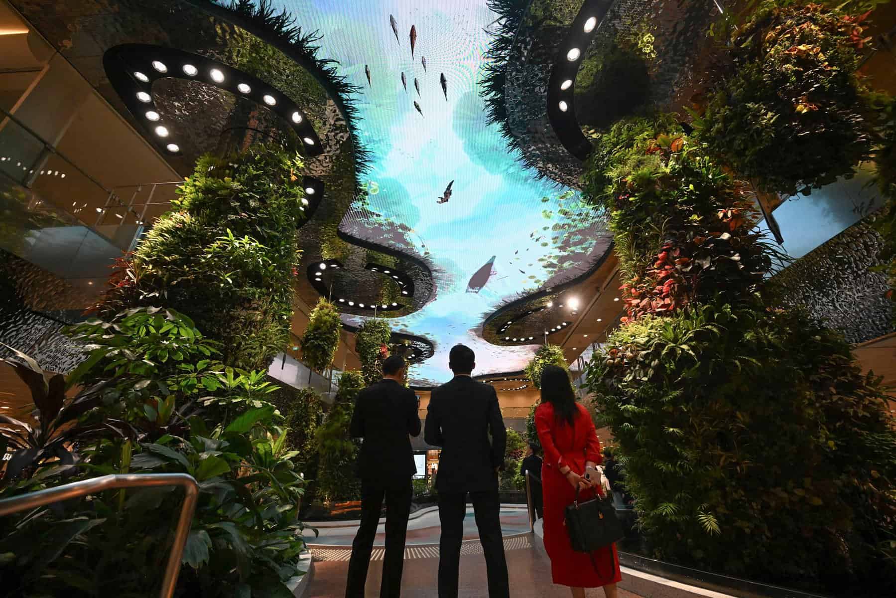 Visitors looking up a the immersive LED at Dreamscape at Changi airport